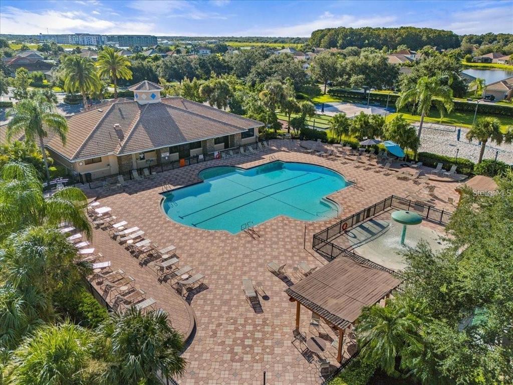8721 Stone Harbour Loop Bradenton, FL 34212 - Photo 59 of 71 an aerial view of a house with a garden