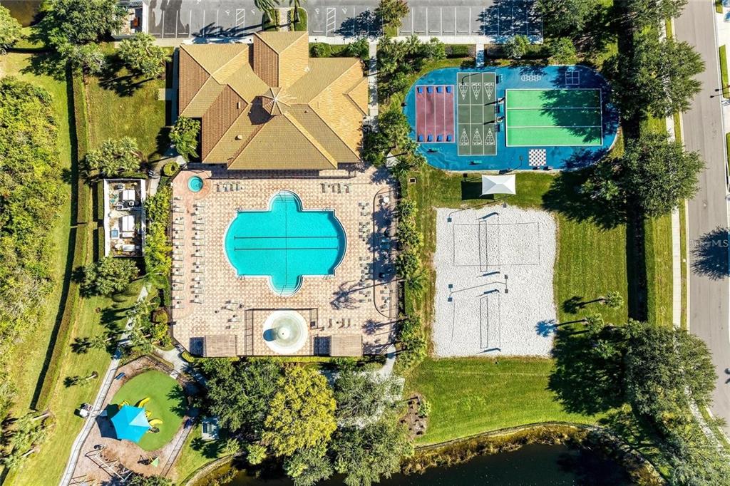 8721 Stone Harbour Loop Bradenton, FL 34212 - Photo 61 of 71 an aerial view of a house with a yard and a large pool
