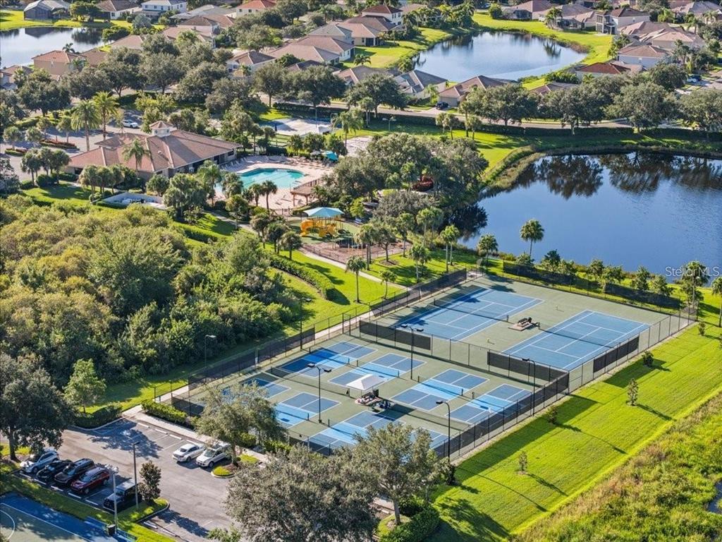 8721 Stone Harbour Loop Bradenton, FL 34212 - Photo 63 of 71 an aerial view of a house with a lake view