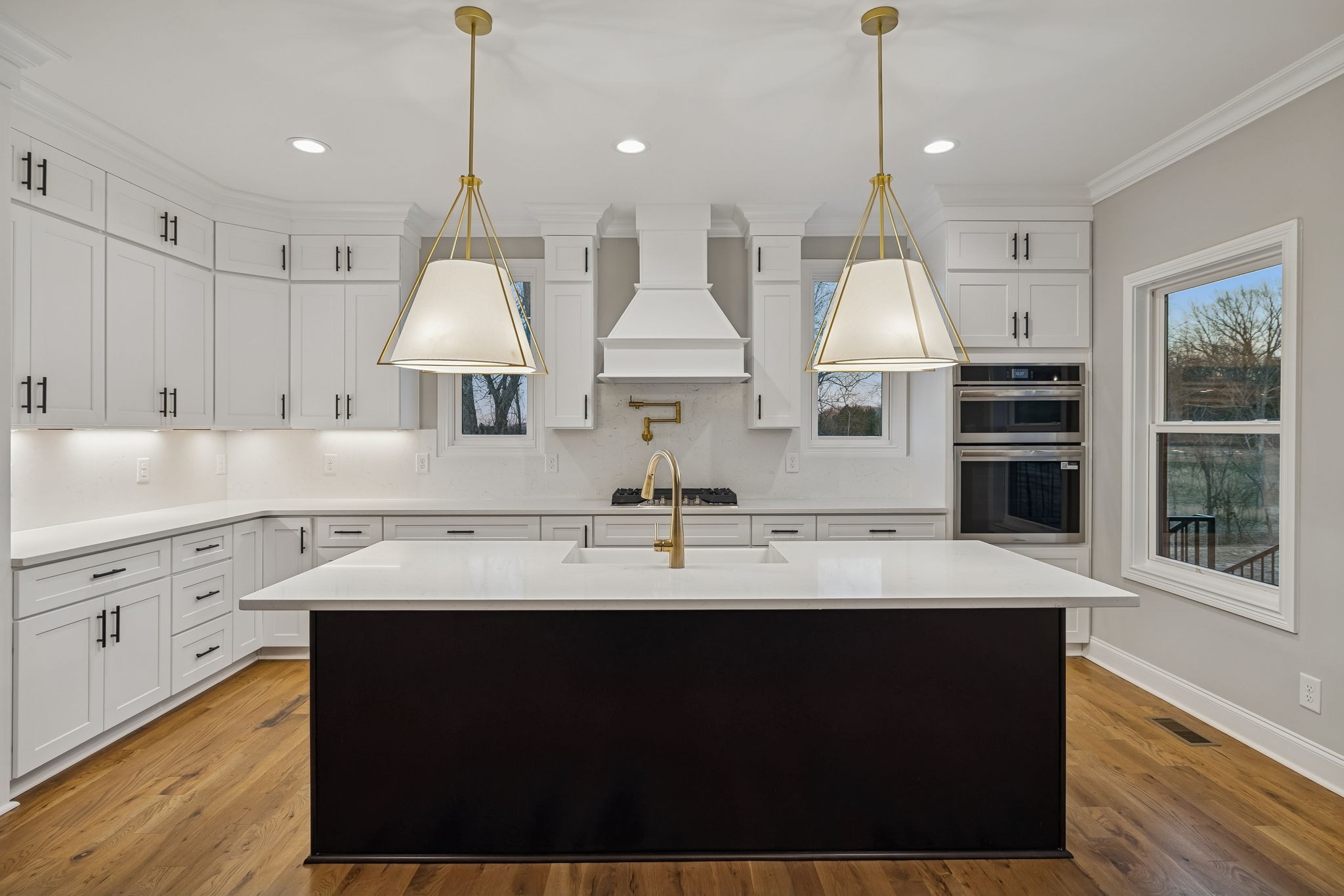 13645 Cainsville Road Lebanon, TN 37090 - Photo 15 of 60 a kitchen with stainless steel appliances granite countertop a sink a stove and a wooden floors