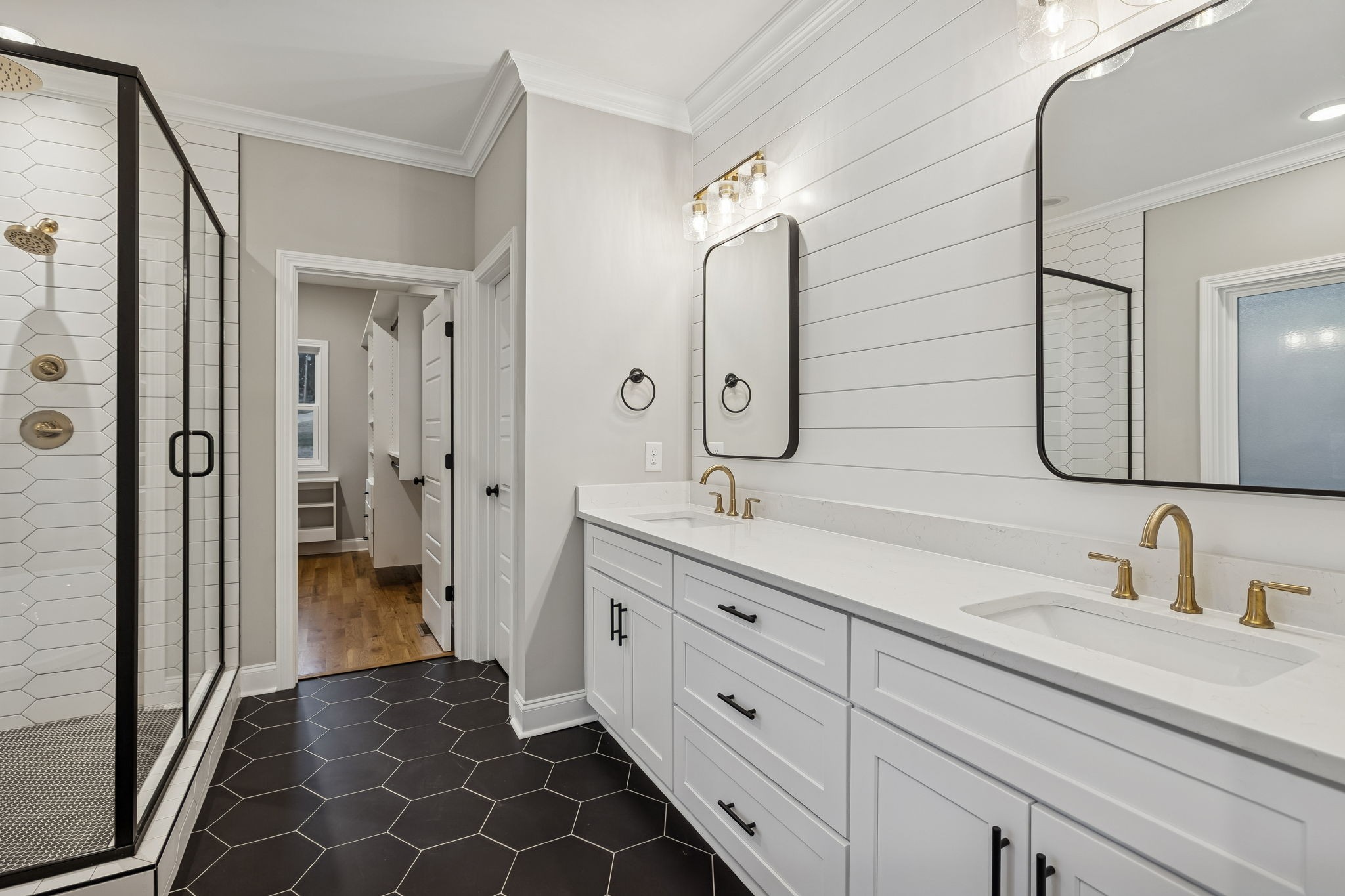 13645 Cainsville Road Lebanon, TN 37090 - Photo 23 of 60 a bathroom with a double vanity sink mirror and shower