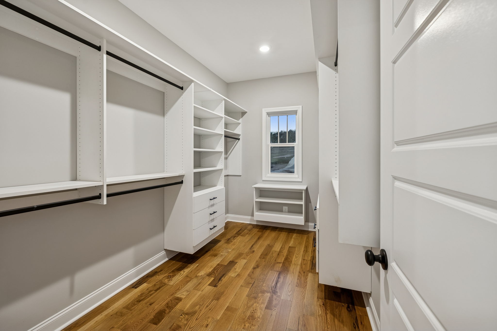 13645 Cainsville Road Lebanon, TN 37090 - Photo 26 of 60 a view of walk in closet with empty racks