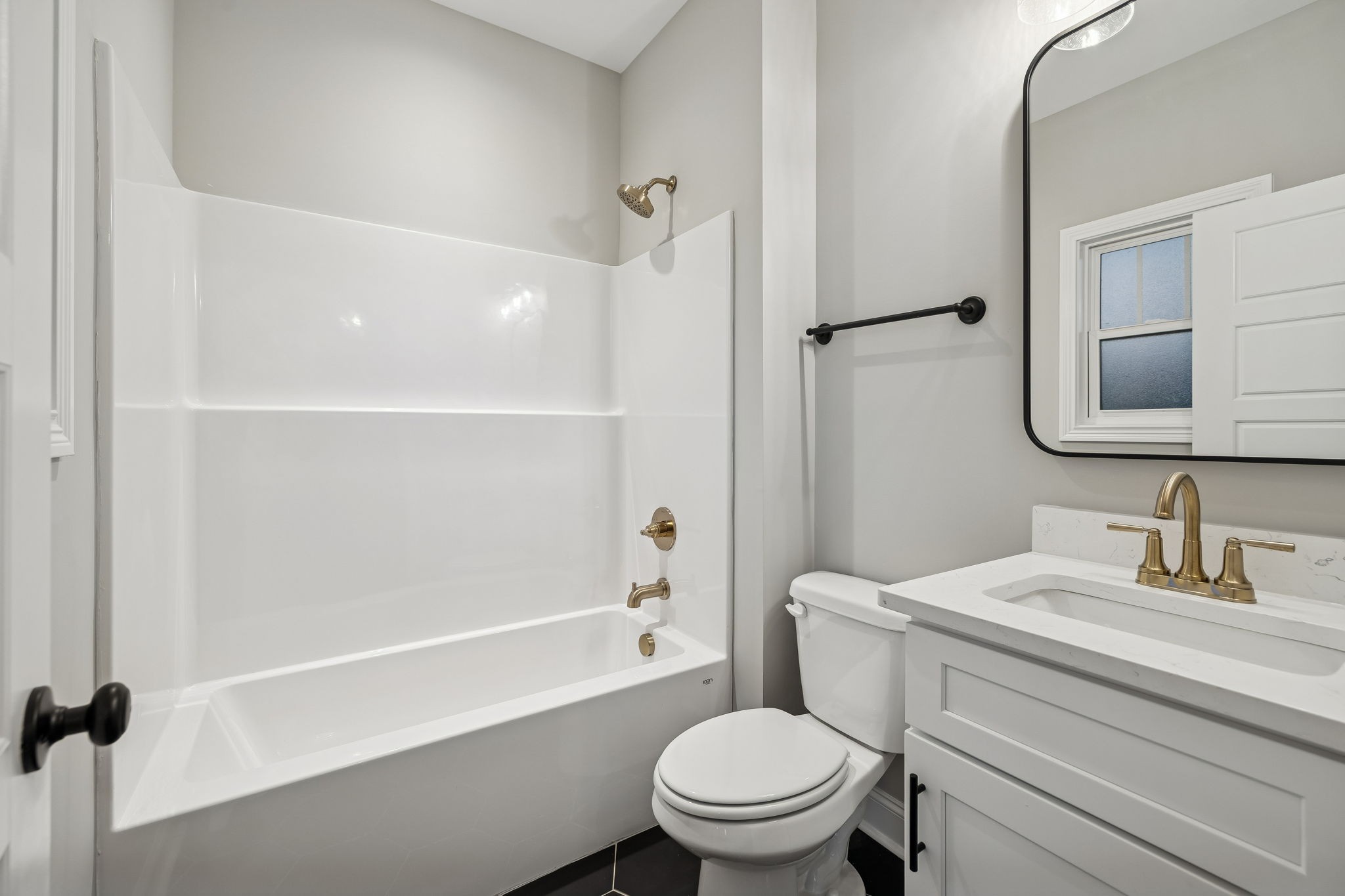 13645 Cainsville Road Lebanon, TN 37090 - Photo 30 of 60 a bathroom with a granite countertop toilet a sink and a bathtub