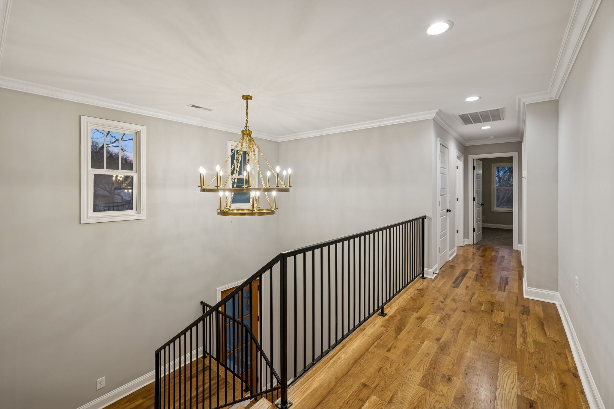 13645 Cainsville Road Lebanon, TN 37090 - Photo 31 of 60 a view of a hallway with wooden floor and staircase