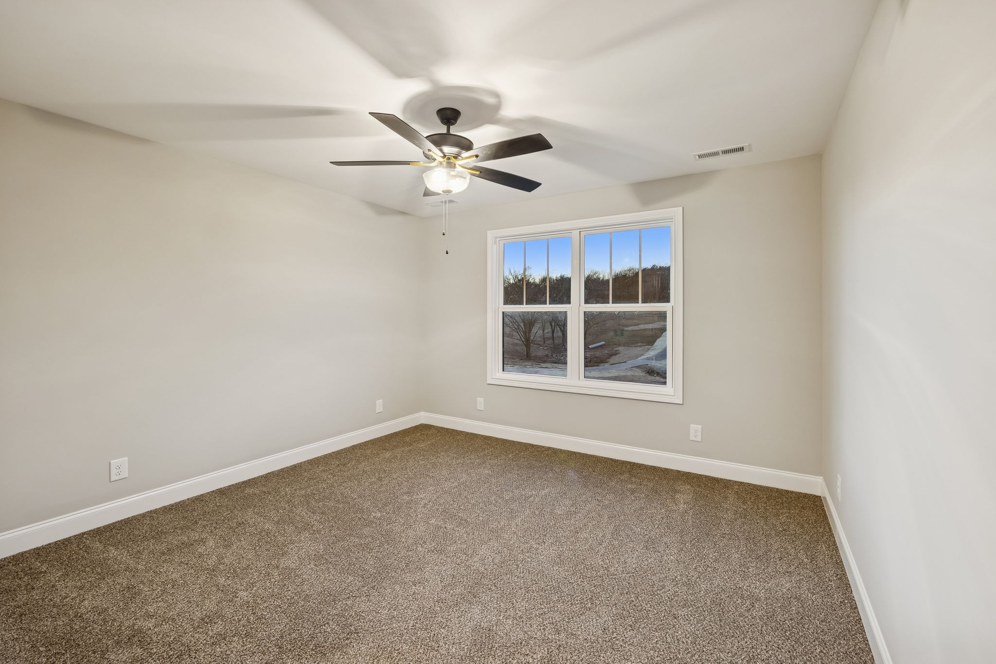 13645 Cainsville Road Lebanon, TN 37090 - Photo 32 of 60 a view of an empty room with a window