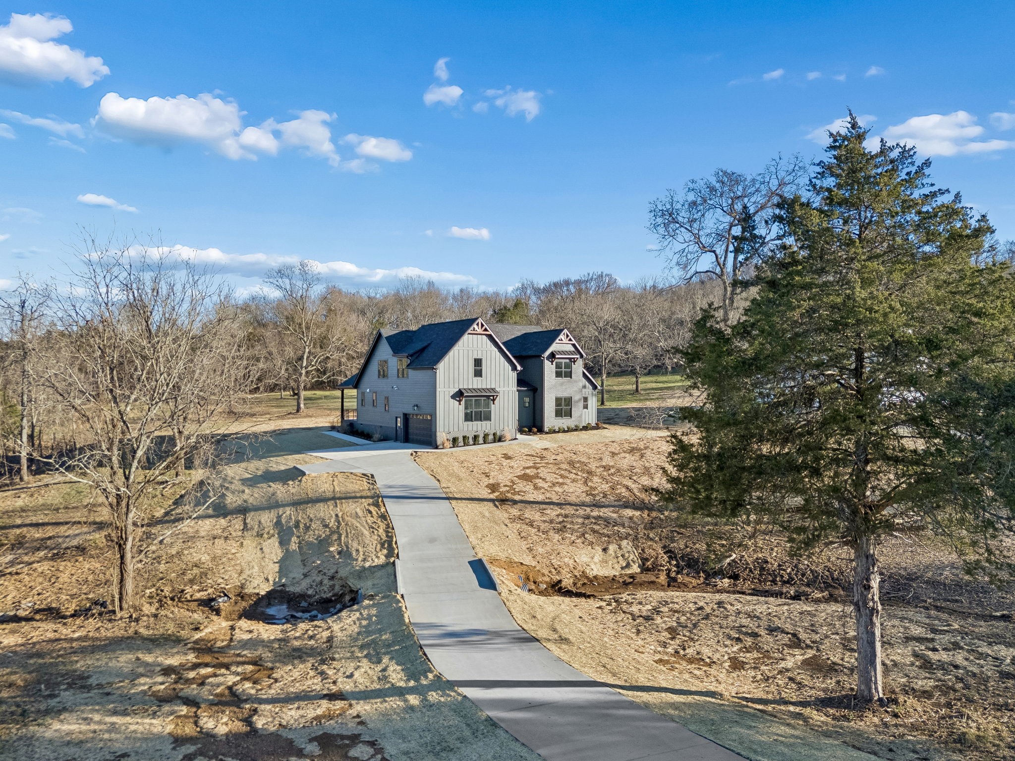 13645 Cainsville Road Lebanon, TN 37090 - Photo 48 of 60 a view of a house with a yard
