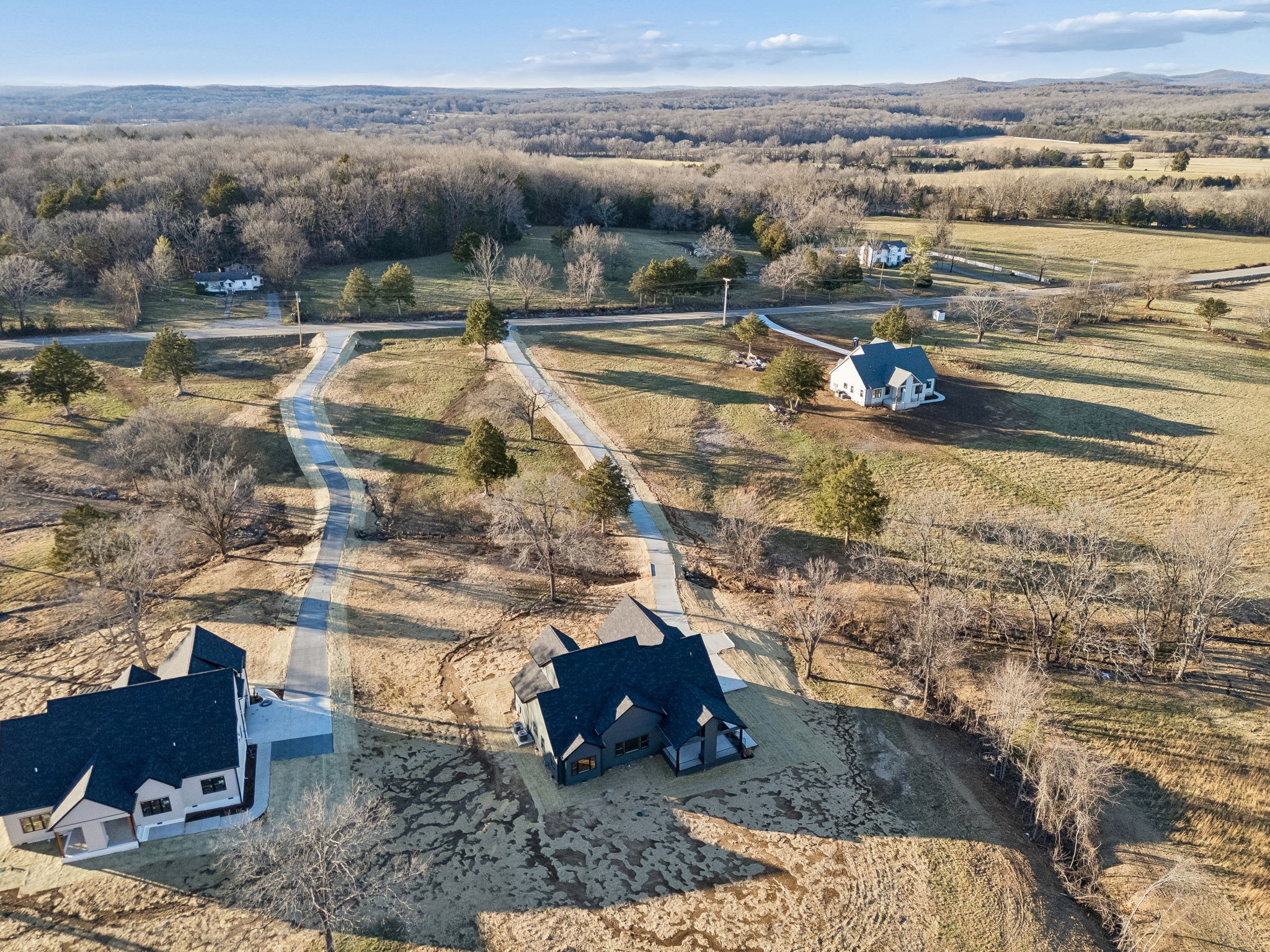 13645 Cainsville Road Lebanon, TN 37090 - Photo 55 of 60 a view of a lake with a mountain