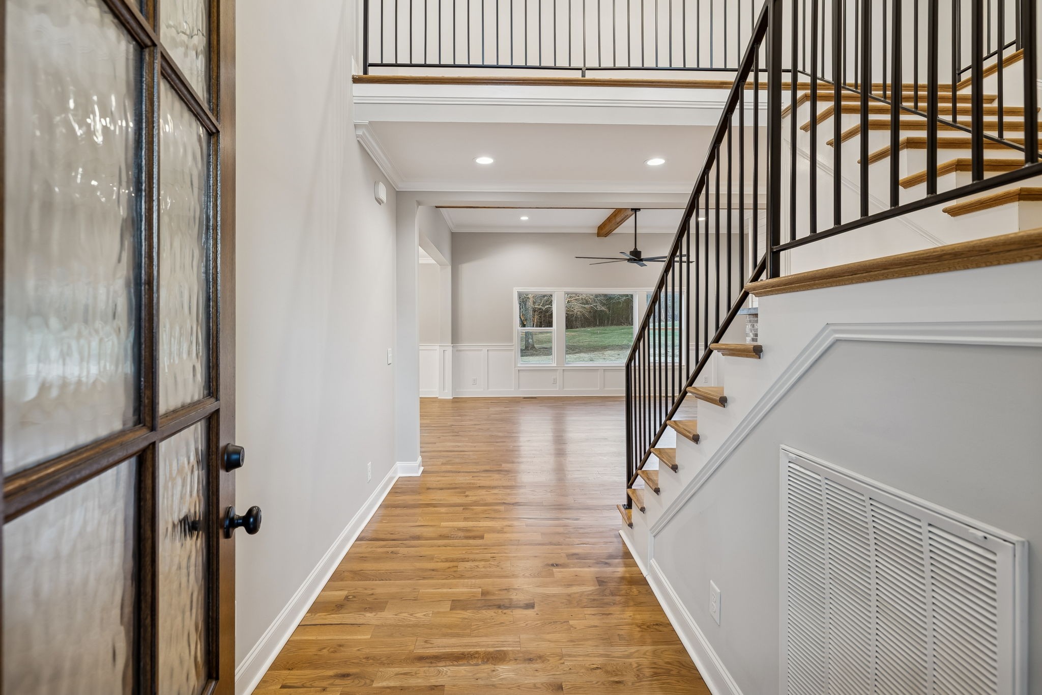 13645 Cainsville Road Lebanon, TN 37090 - Photo 8 of 60 a view of staircase with lots of frames on wall and wooden floor