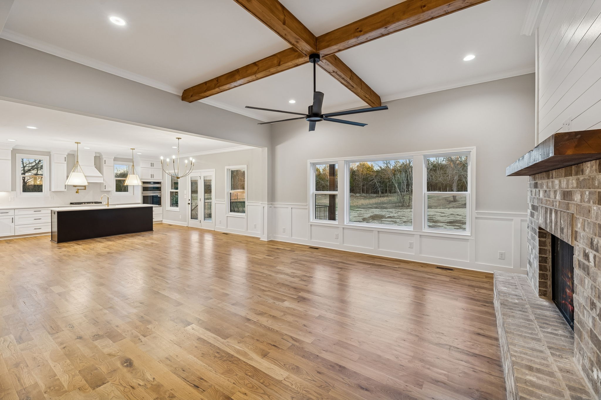13645 Cainsville Road Lebanon, TN 37090 - Photo 10 of 60 a view of empty room with wooden floor and fireplace