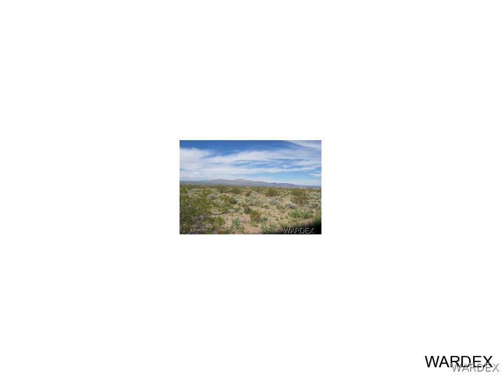 8-acres Amana Road Dolan Springs, AZ 86441 - Photo 1 of 11 a picture of a room with a bench