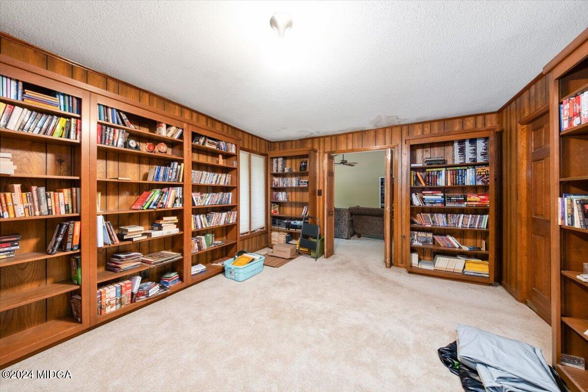 5157 Zebulon Road Macon, GA 31210 - Photo 13 of 34 a view of room with bookshelf and a window