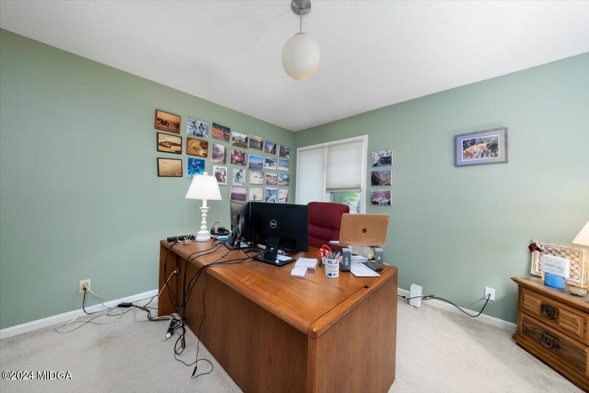 5157 Zebulon Road Macon, GA 31210 - Photo 23 of 34 a room with furniture and a bookshelf