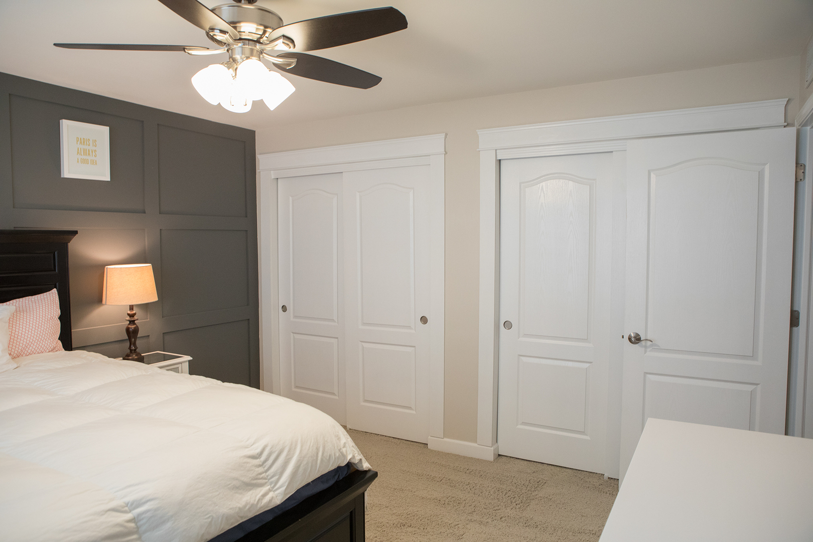 5718 Oak Ridge Way Lisle, IL 60532 - Photo 18 of 29 a bedroom with a bed and a chandelier