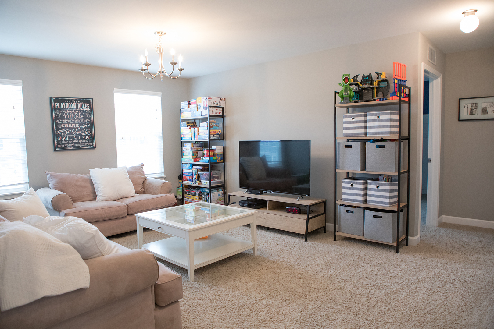 5718 Oak Ridge Way Lisle, IL 60532 - Photo 21 of 29 a living room with furniture and a flat screen tv
