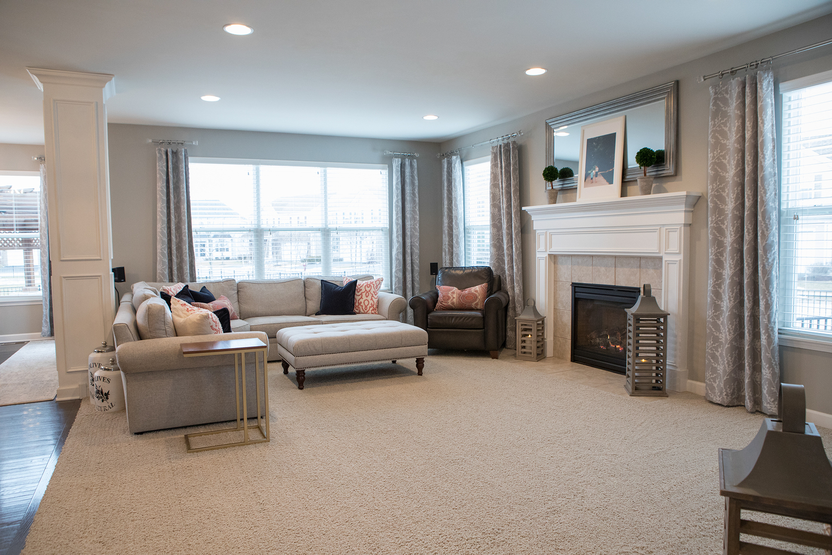 5718 Oak Ridge Way Lisle, IL 60532 - Photo 5 of 29 a living room with furniture and a fireplace
