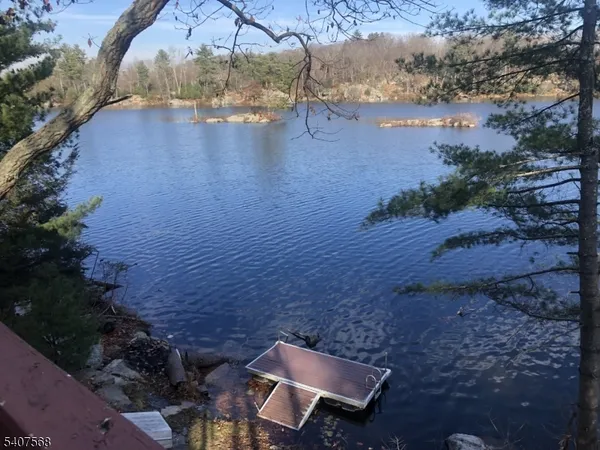 a view of a backyard of the house