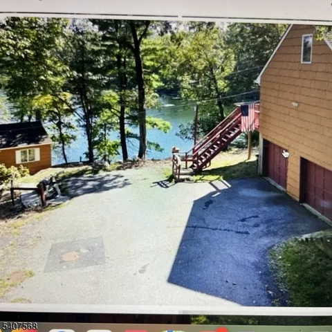 a view of a backyard of the house