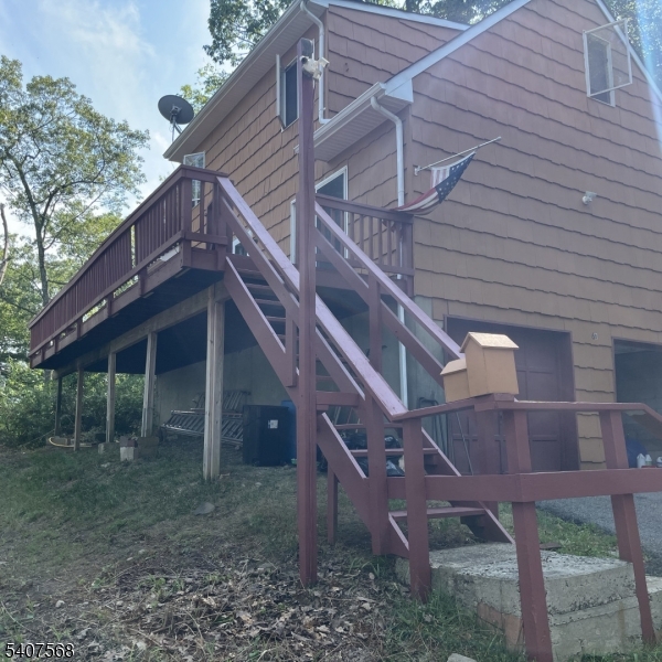 6 Jans Way Andover, NJ 07821 - Photo 3 of 11 a view of a house with a yard