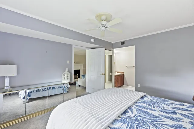 a bedroom with bed and window