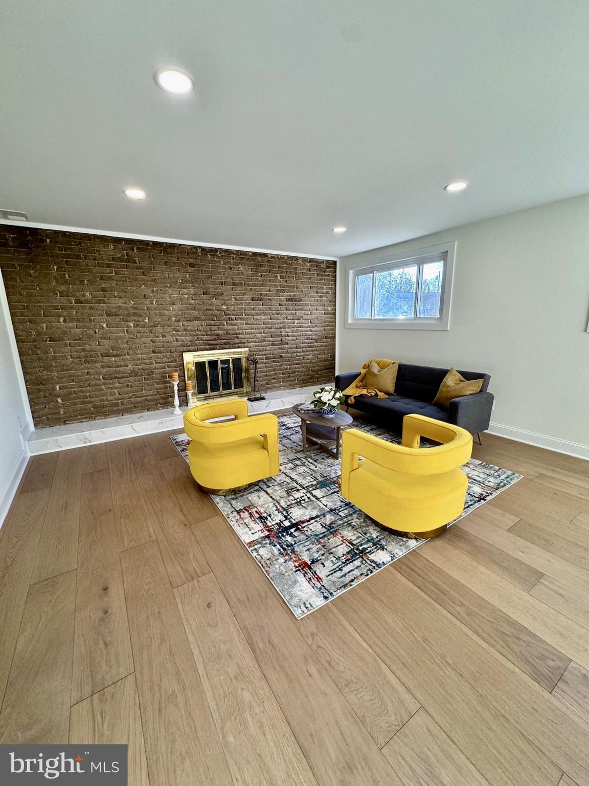 7023 Dolphin Road Lanham, MD 20706 - Photo 27 of 47 a living room with furniture and a table