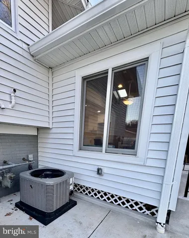 a view of street with yard and trees