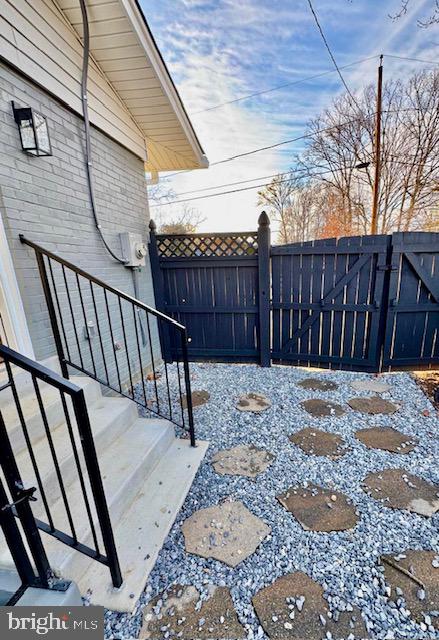 7023 Dolphin Road Lanham, MD 20706 - Photo 45 of 47 a view of a backyard with a fence