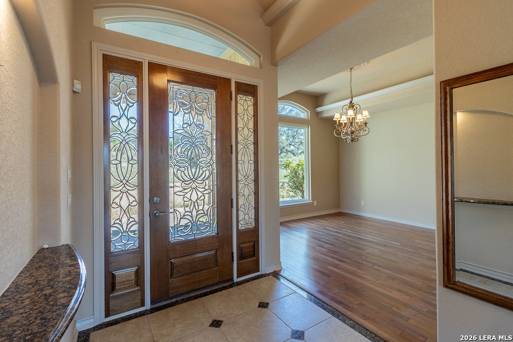 198 Echo Falls Road Comfort, TX 78013 - Photo 11 of 28 a view of entryway with wooden floor