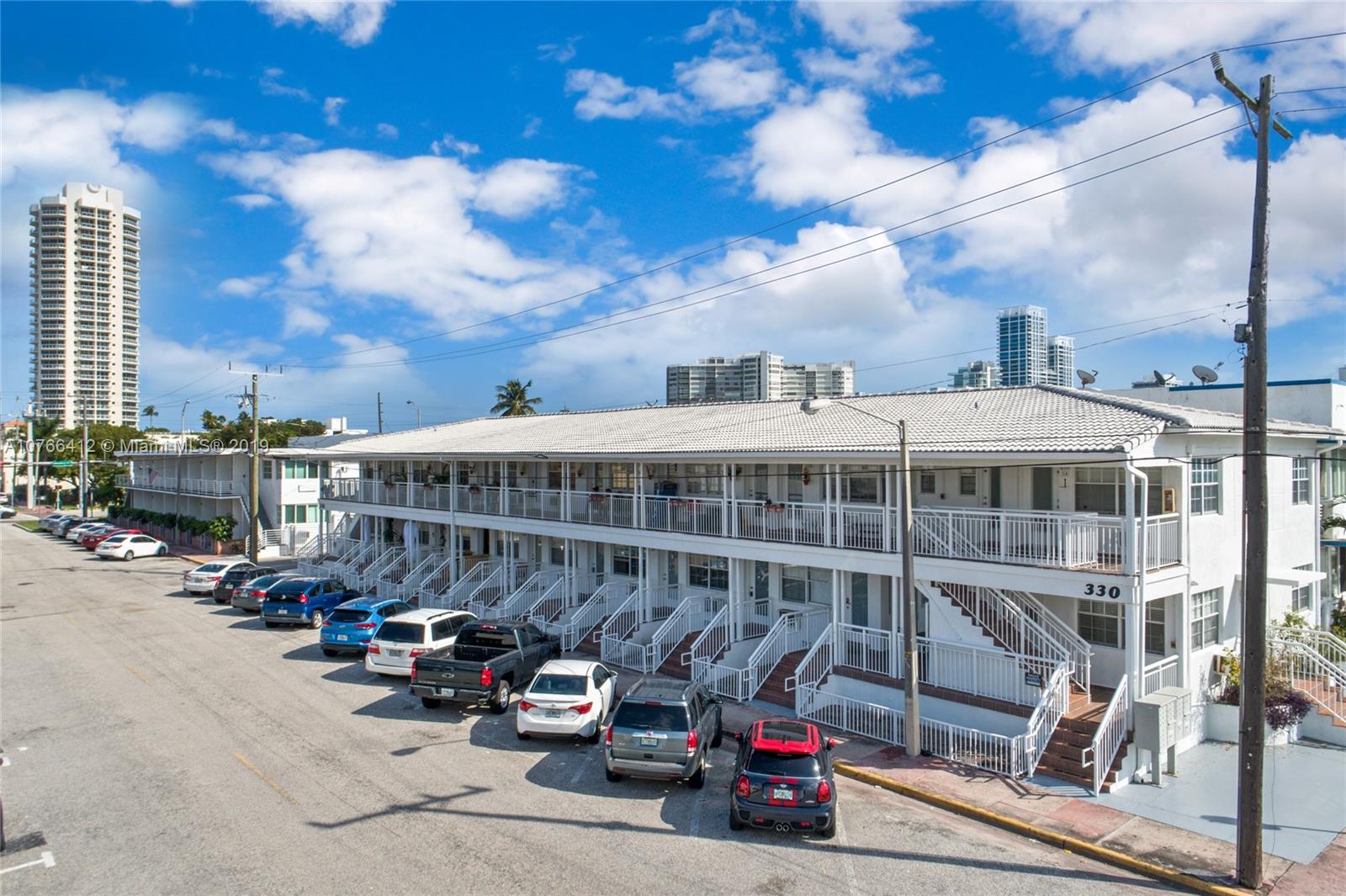 330 74th Street, Unit 7 Miami Beach, FL 33141 - Photo 25 of 27 a view of a street with cars
