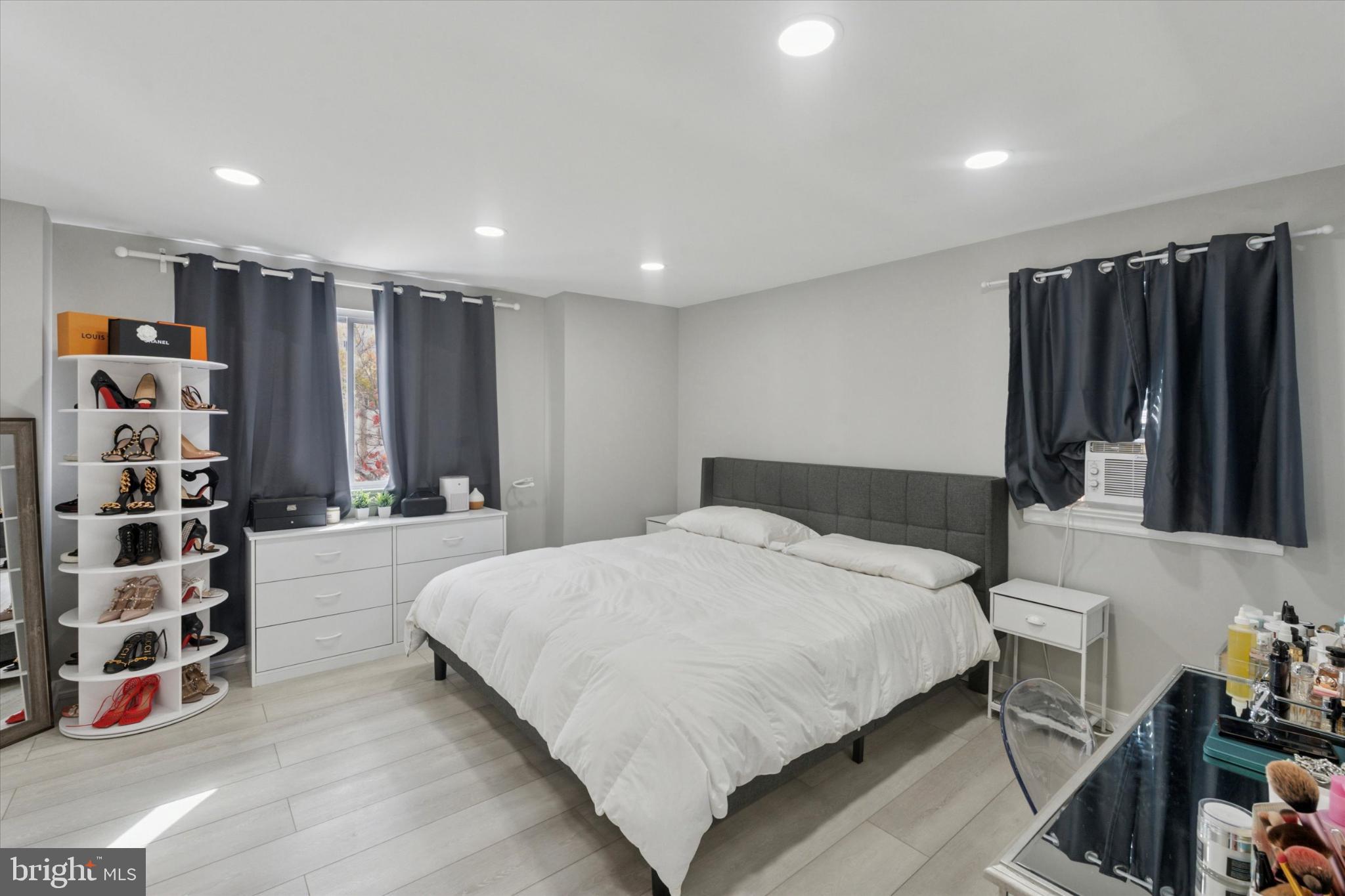 9938 Alicia Street Philadelphia, PA 19115 - Photo 5 of 15 a spacious bedroom with a bed and a walk in closet