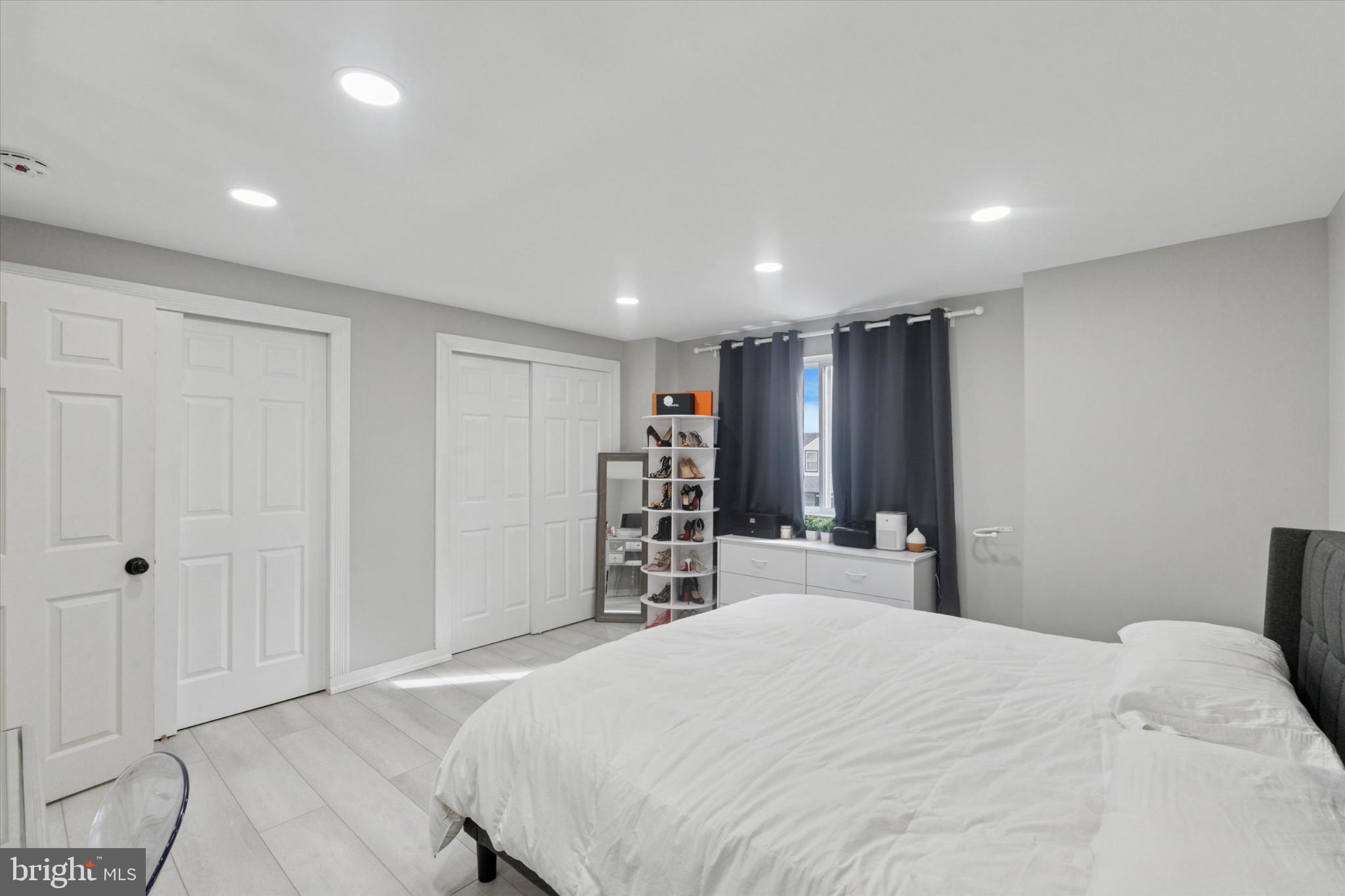 9938 Alicia Street Philadelphia, PA 19115 - Photo 6 of 15 a bed room with a bed and a television