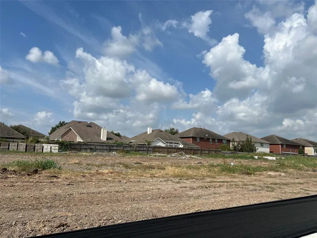a view of a lake with a big yard