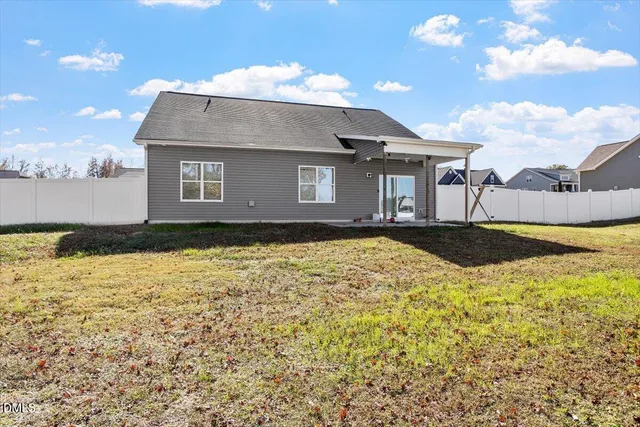 a house view with a swimming pool