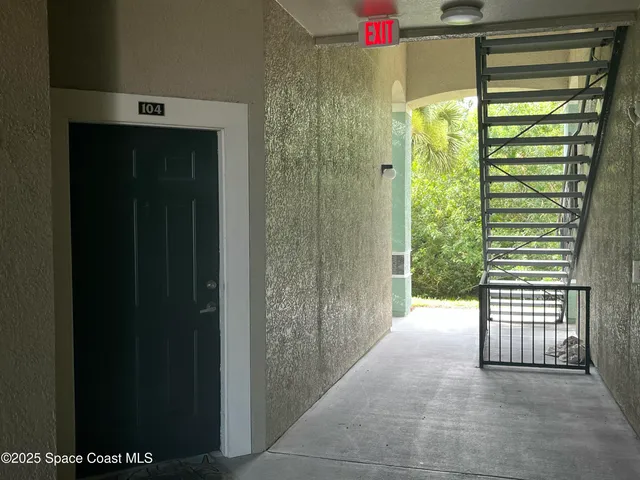 a view of entryway with stairs