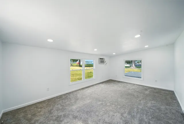 an empty room with windows