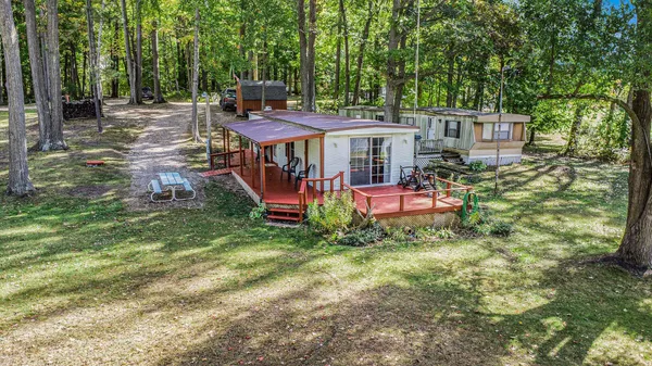 $123,500 | 4499 Woodland Drive, Six Lakes, MI 48886