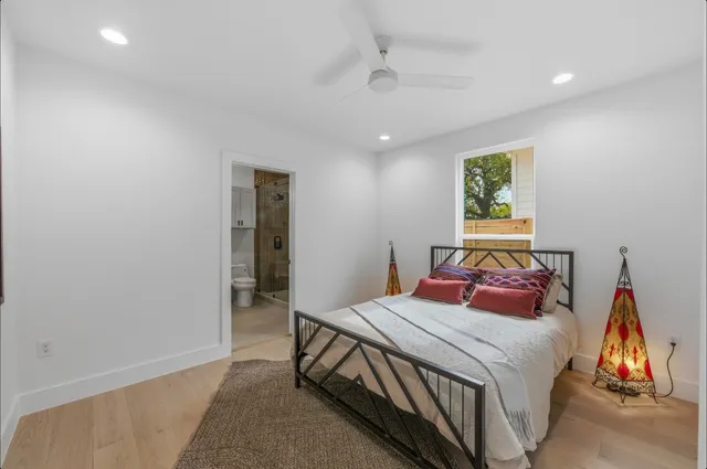 a kitchen with a refrigerator a stove and a cabinets