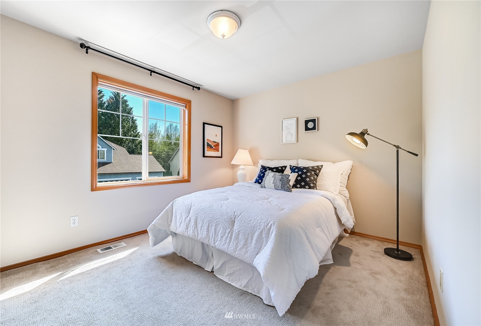 1125 185th Place Southeast Bothell, WA 98012 - Photo 16 of 23 a bedroom with a bed and window