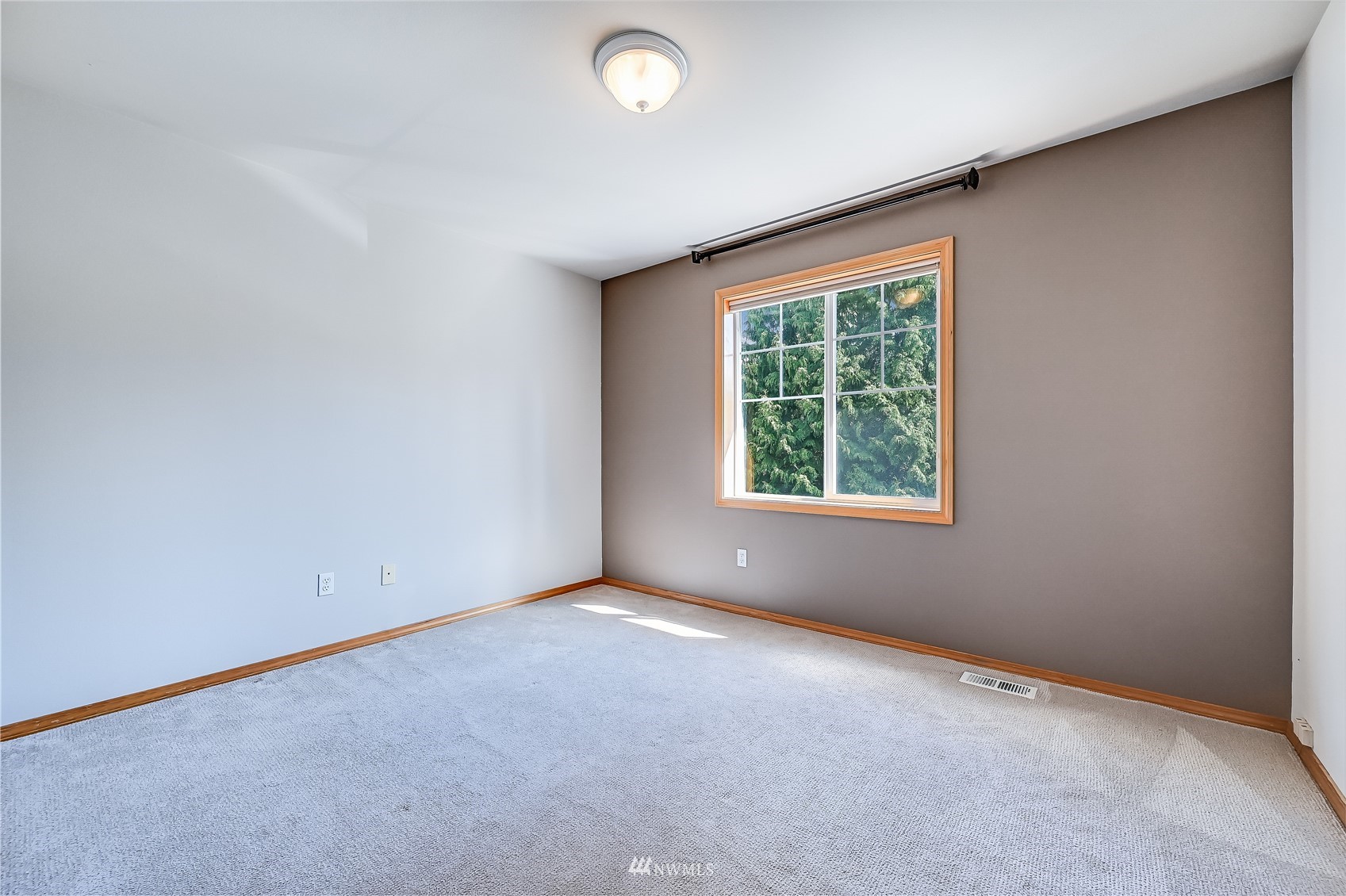1125 185th Place Southeast Bothell, WA 98012 - Photo 17 of 23 an empty room with windows