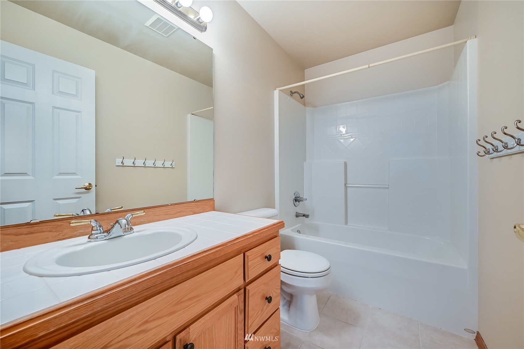 1125 185th Place Southeast Bothell, WA 98012 - Photo 18 of 23 a bathroom with a sink a toilet and shower