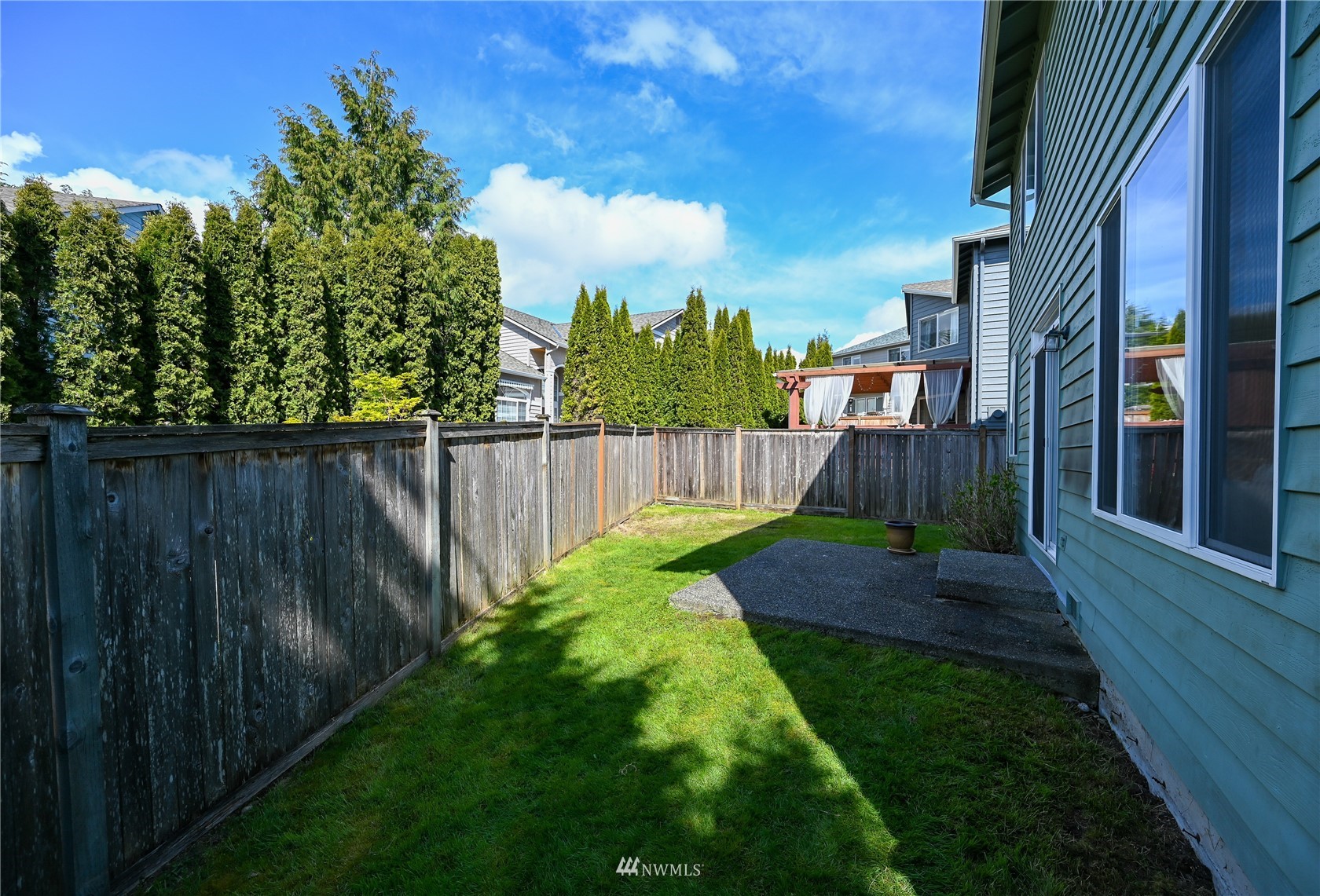 1125 185th Place Southeast Bothell, WA 98012 - Photo 21 of 23 a view of a backyard with a plants and trees