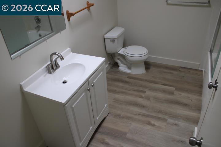 615 Lexington Avenue El Cerrito, CA 94530 - Photo 13 of 19 a bathroom with a sink and a toilet