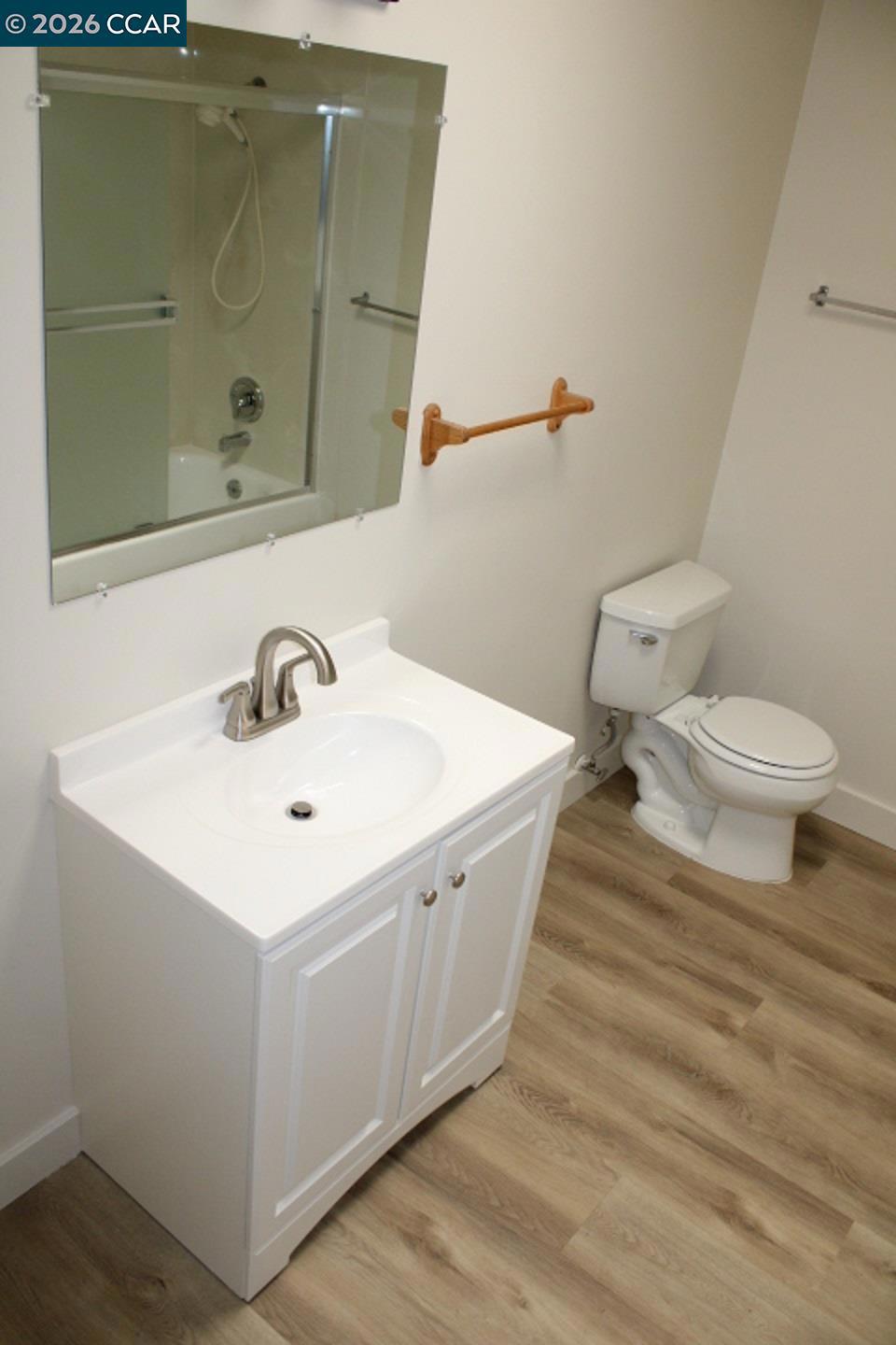 615 Lexington Avenue El Cerrito, CA 94530 - Photo 14 of 19 a bathroom with a sink and a mirror