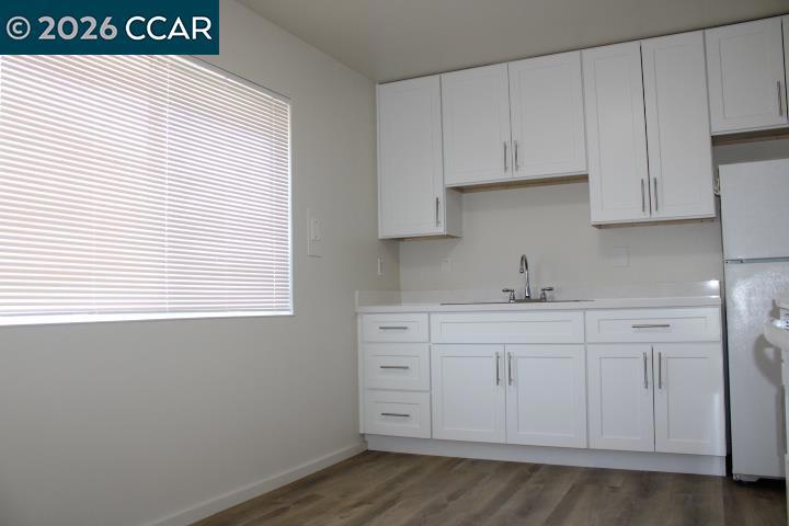 615 Lexington Avenue El Cerrito, CA 94530 - Photo 6 of 19 a view of cabinets a sink and dishwasher in a kitchen