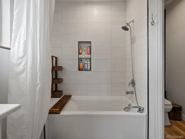 a bathroom with a bathtub