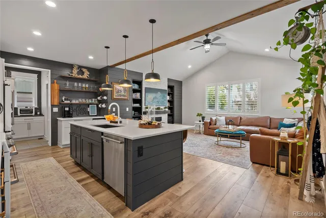 a kitchen with stainless steel appliances granite countertop lots of counter top space