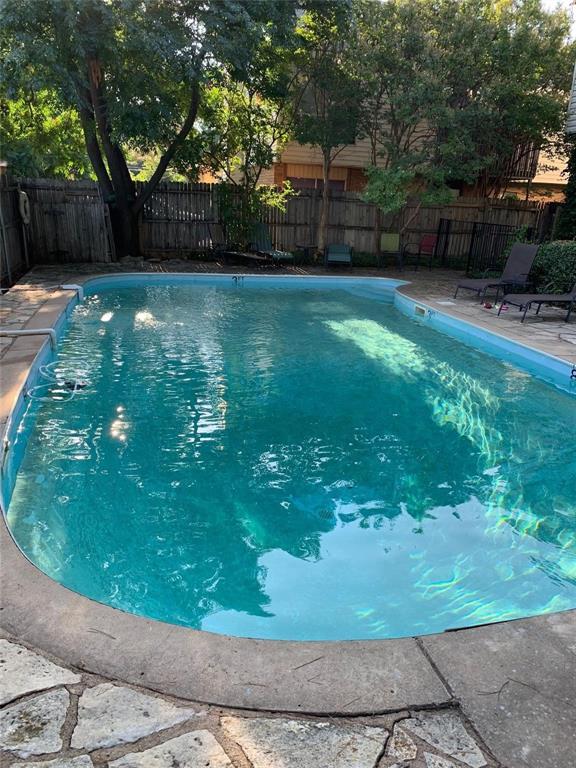2236 Irwin Street Fort Worth, TX 76110 - Photo 10 of 11 a backyard of a house with lots of green space