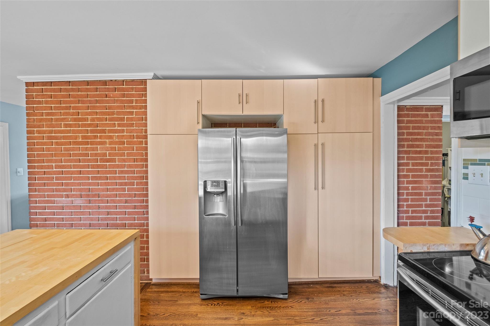4439 Applegate Road Charlotte, NC 28209 - Photo 11 of 34 a kitchen with stainless steel appliances granite countertop a refrigerator and a stove