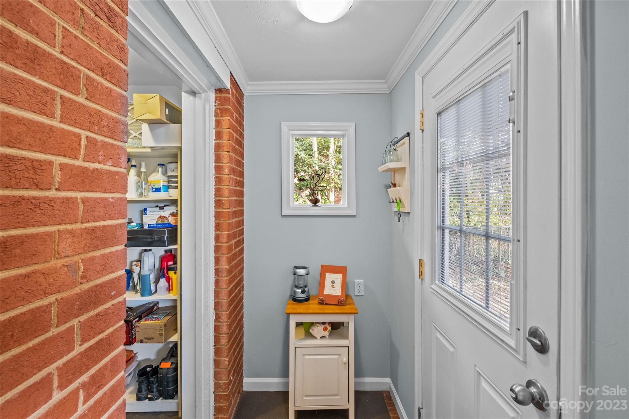 4439 Applegate Road Charlotte, NC 28209 - Photo 14 of 34 a view of walk in closet with clothes and shoes