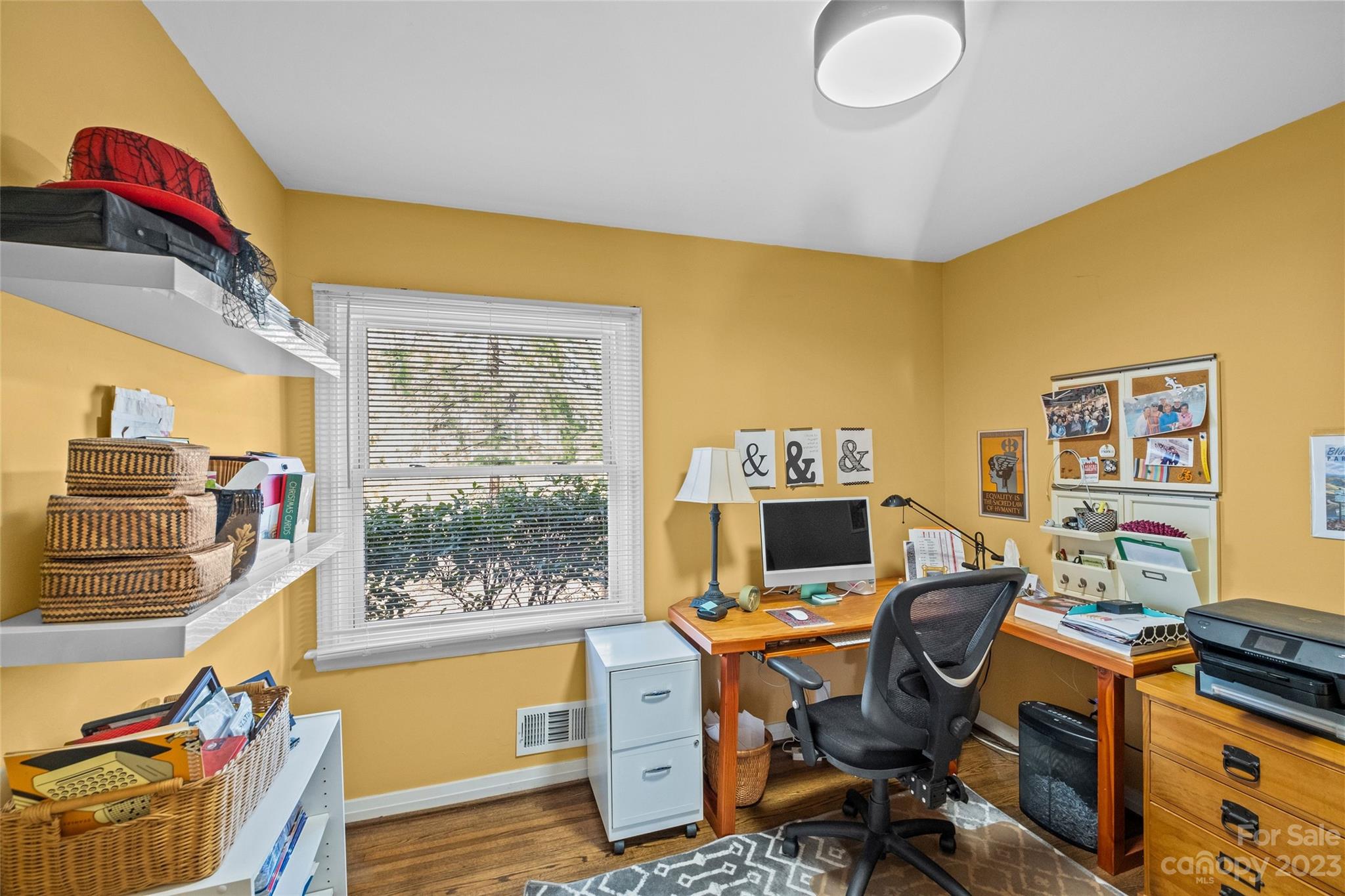 4439 Applegate Road Charlotte, NC 28209 - Photo 18 of 34 a view of a workspace with furniture and a window
