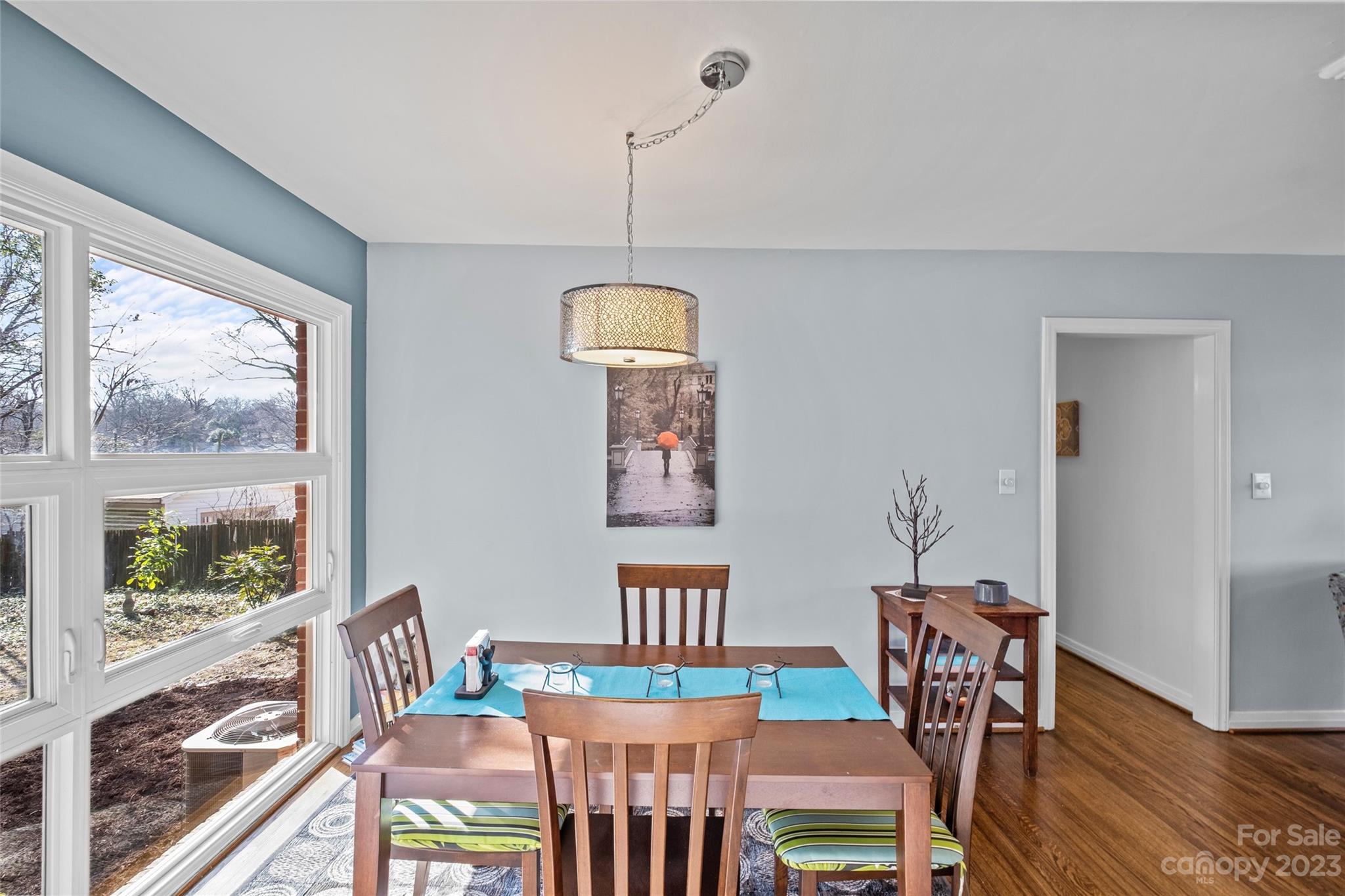 4439 Applegate Road Charlotte, NC 28209 - Photo 29 of 34 a view of a dining room with furniture window and wooden floor